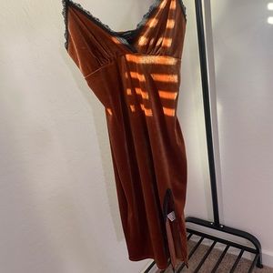 Burnt orange velvet dress with black lace trim